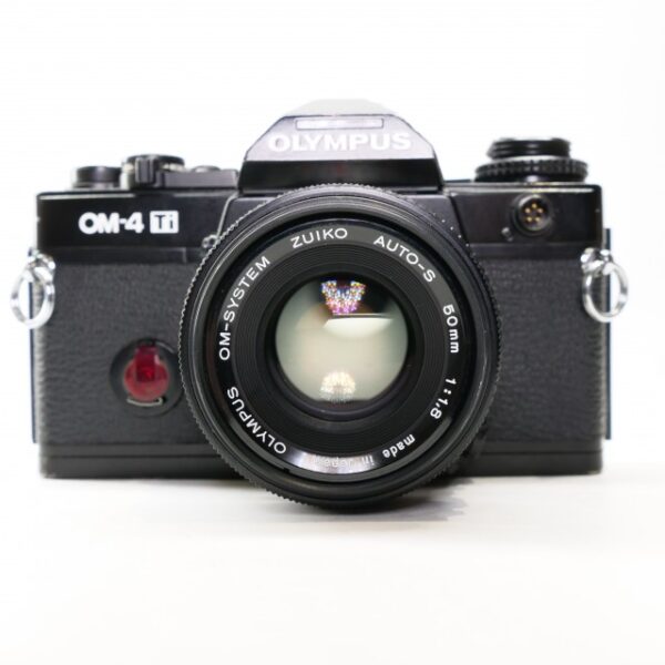Used Olympus OM-4 Ti 35mm SLR with 50mm lens, black