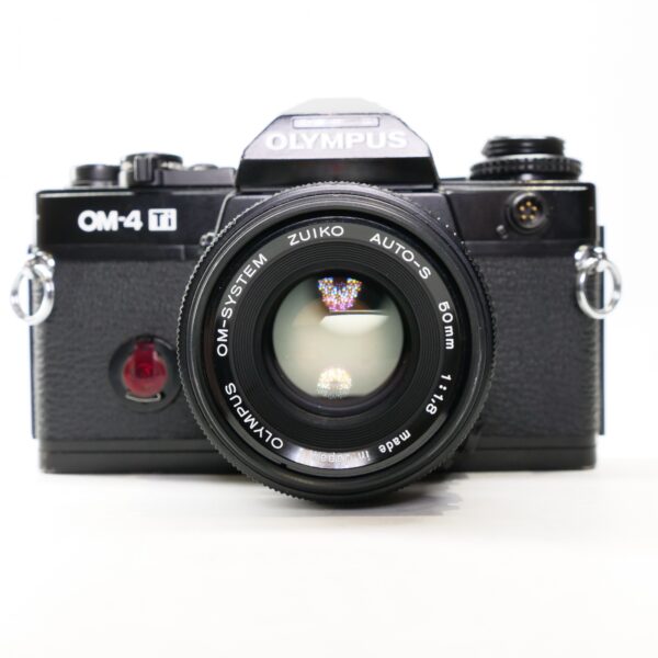 Used Olympus OM-4 Ti 35mm SLR with 50mm lens, black