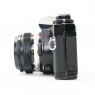 Used Olympus OM-4 Ti 35mm SLR with 50mm lens, black